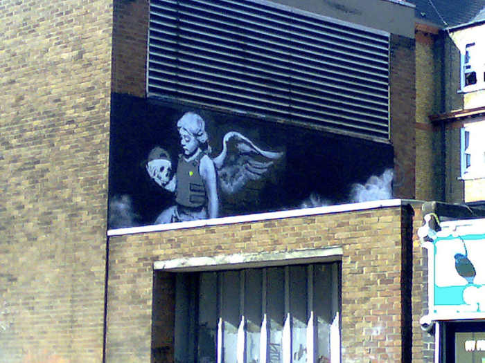 Ozone's Angel by Banksy. Although still considered vandalism by some, Banksy's art can now often fetch big prices when auctioned.