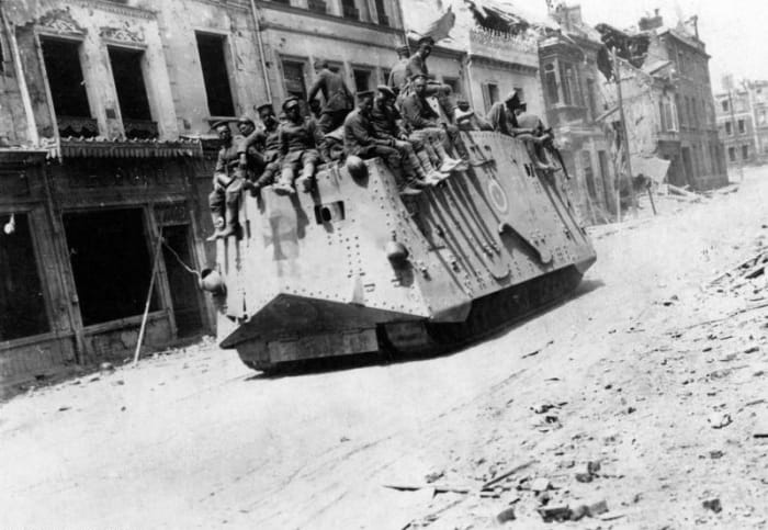 WW1: 21 March 1918: German tanks in Roye during the Battle of France (First World War) (March-July 1918). Seen from the rear.