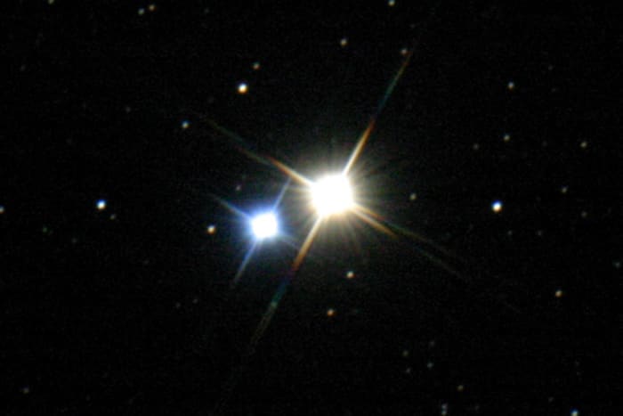 Albireo - a true binary star in which an orange giant star and a hot blue star revolve around each other at great distance