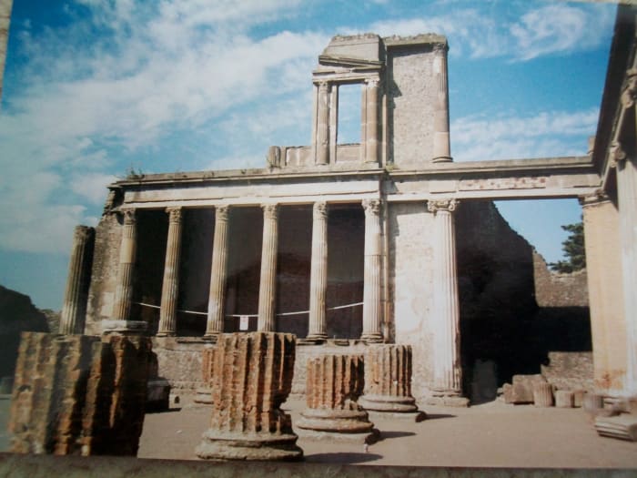 The ruins of the basilica at Pompeii give us a sense of the Greek influence on Roman architecture.