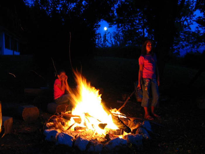The campfire we all enjoy is a chemical reaction between the organic chemicals in wood and oxygen in the air.