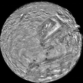 Miranda is Latin for "ought to be wondered at," and we really wonder what happened to make that giant chevron-mark. The large "fingerprint" on the southern hemisphere is also a puzzle.