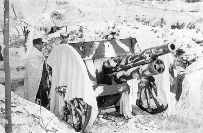 WW2: The most common Finnish artillery was a 76 millimeter gun dating back to around the year 1902. The gun stands as camouflaged in the city of Viipuri in March 1940.