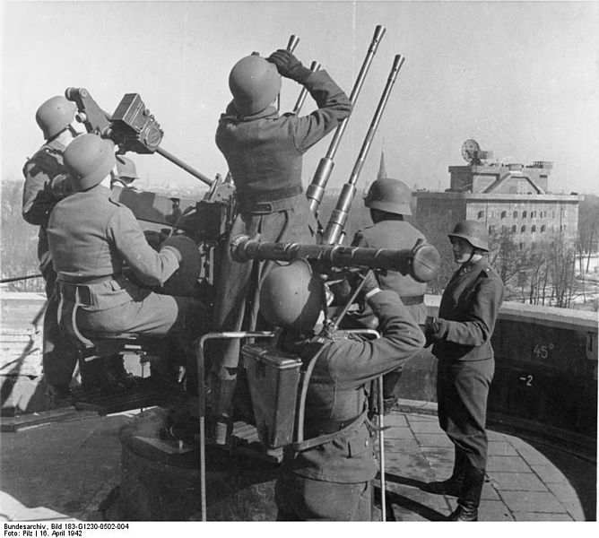 WWII: Berlin: 20 mm anti-aircraft crew on a G-Tower (Combat Tower). In the distance is its sister L-Tower (Command Tower).
