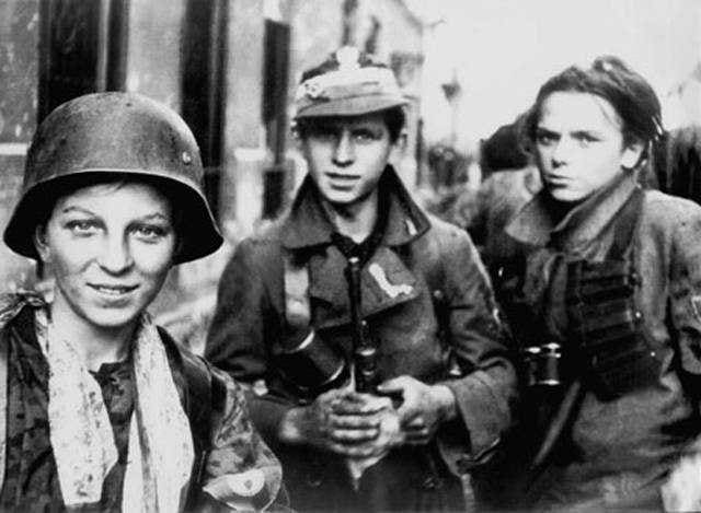 WWII: Warsaw Uprising: Very young soldiers from the "Radoslaw Regiment". September 2, 1944.