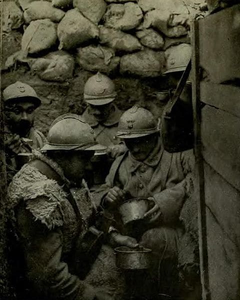 French troops in WWI. Life was grim and in a confined space like this, lice were able to spread from man to man.