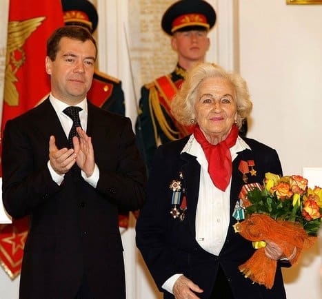 WW2: Nadezhda Popova. As a Night Witch she was shot down several times. She flew 18 missions in one night. Standing with Russian president Medvedev in 2009