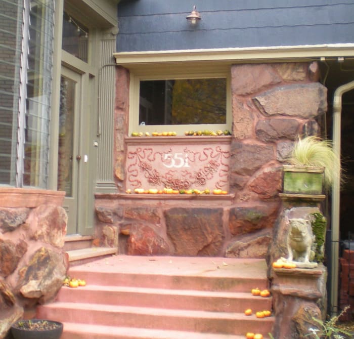 Closeup view of entrance at 551 W. Stratford Place. Note detailed ornamentation on address stone.