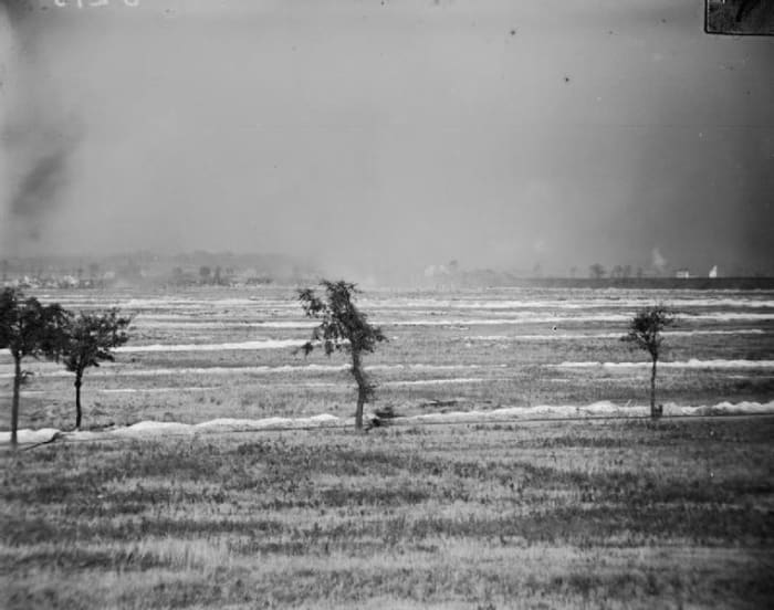 World War One: Photograph showing the British attacking the Hohenzollern Redoubt during the Battle of Loos. A cloud of smoke and gas appears in the centre and left.