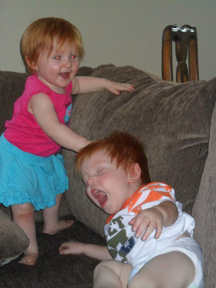 This is my niece and my cousins son. My niece is not violent but this was a funny picture that I thought embraced the concept.