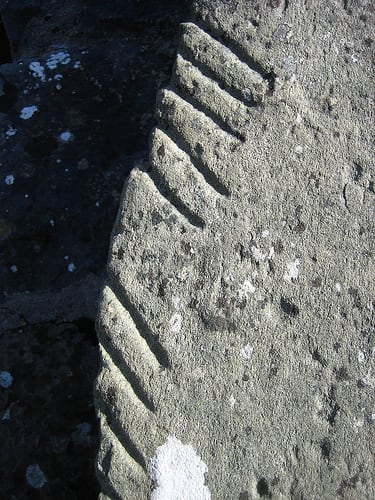 An ancient Druid stone from Ireland, showing Ogham, an early form of writing composed of groups of straight lines. Before paper was invented, sending a letter would have been quite difficult!