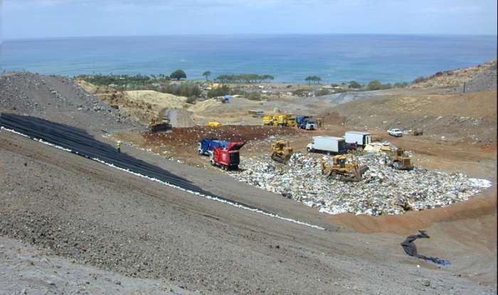 Modern landfill operation at Waimanalo Gulch, the municipal sanitary landfill for the City & County of Honolulu.