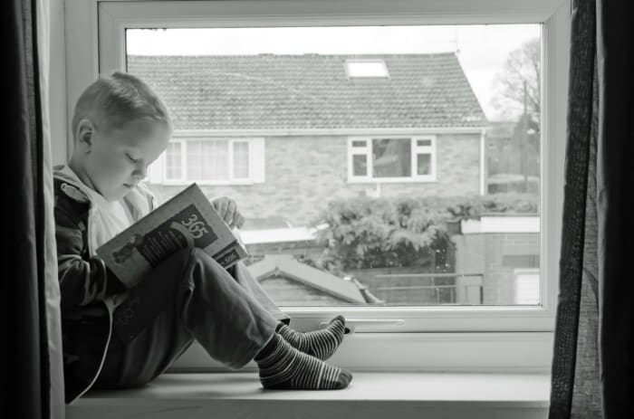 Child Reading: Reader Response is the thoughts in your head as you read.
