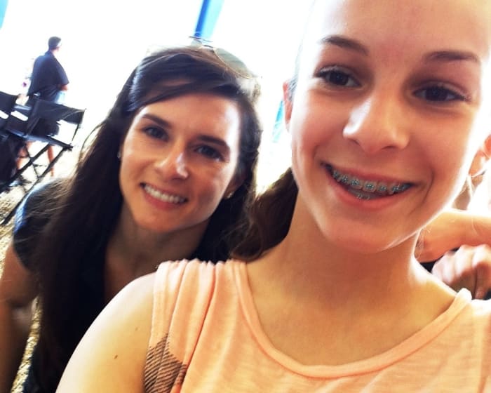 Auto racing driver Danica Patrick poses with my daughter for a selfie. But wait a minute -- what about a selfie with your mother?
