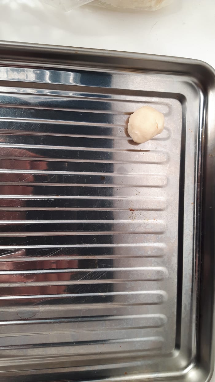 There is enough butter in these cookie so they do not stick to the pan like other cookies would.