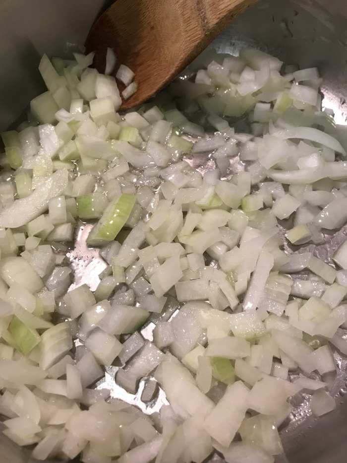 Saute the onion and turnip for a few minutes over medium heat in olive oil. Cook them just until they are softened a bit and fragrant, about ten minutes or so.