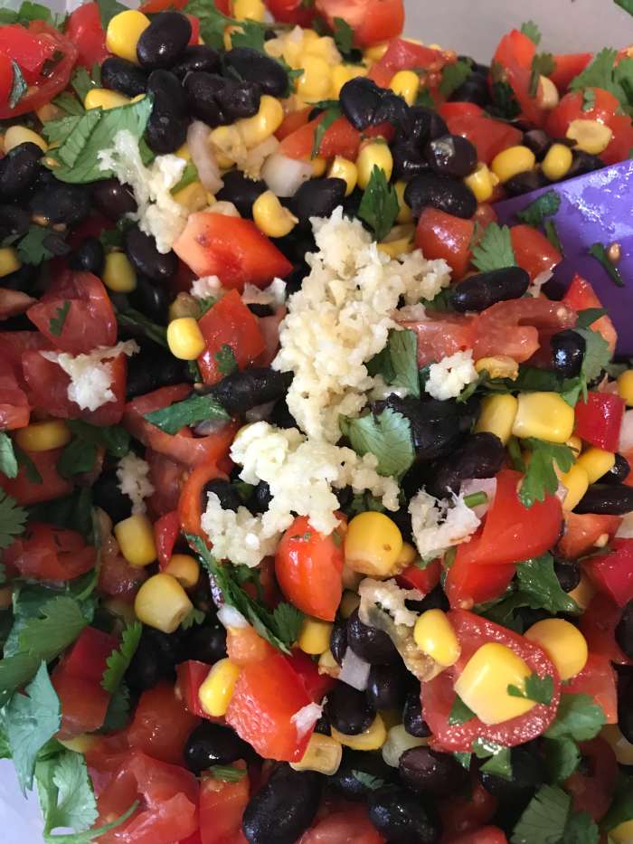 Kosher salt, black pepper and fresh garlic are the perfect seasonings for the sweetness of the corn, tomatoes and peppers. Season to taste, and remember, cold foods need a bit more seasoning than hot foods.
