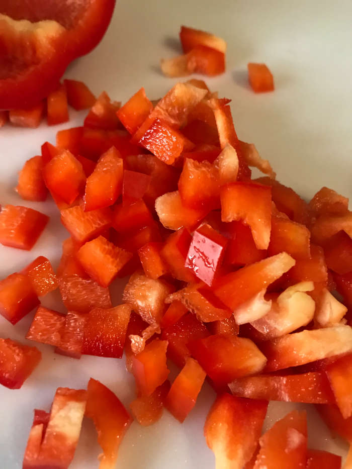 You can use any color of bell pepper you like - I like to go with red, orange or yellow both for their sweetness, and because it's harder to find those veggies in other places. The more color range, the more nutrition, so shake it up!