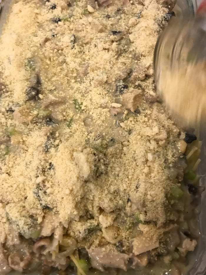 Finish the casserole with a little more Parmesan, and pop the dish into the oven. Let it bake, uncovered, for about 40 minutes, or until it's golden brown on top and bubbly throughout.
