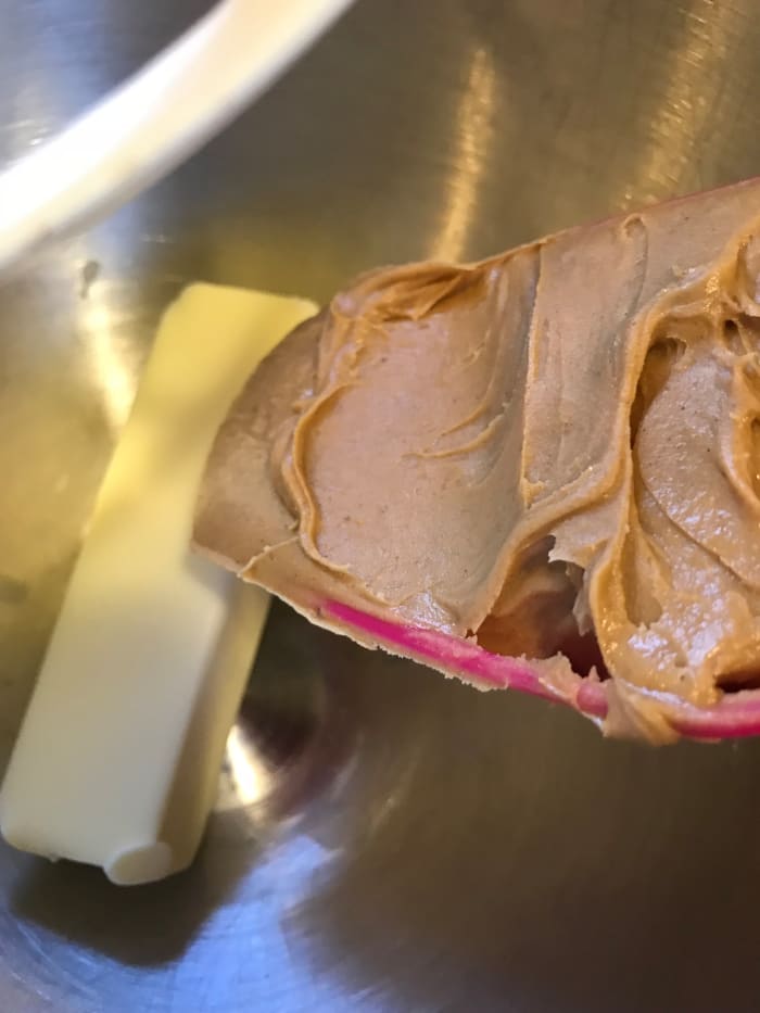 Start by creaming together a stick (1/2 cup) butter with 1 1/2 cups of creamy peanut butter. You can use chunky peanut butter if you like—it's your candy—make it how YOU like!