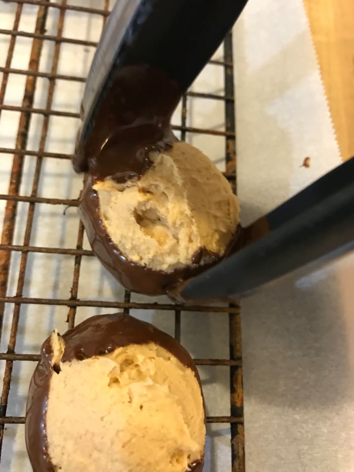 Set the dipped candies on a wire rack to dry. I like to pop them back into the fridge to let everything just chill for a while. This sets the chocolate and makes them easier to handle.