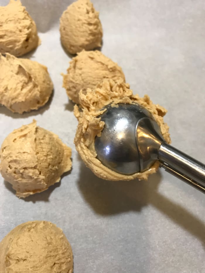 IF YOU WANT, roll the balls until they are smooth—just like you would a meatball. It makes the final candy smoother. I go with fast and rustic—l leave them alone. Nobody cares once they taste them.