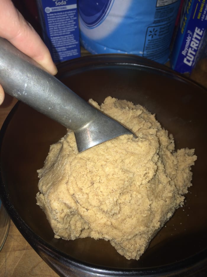 Remove the dough from the refrigerator. Then using an ice cream scoop or your hands form the dough into 1-inch balls.