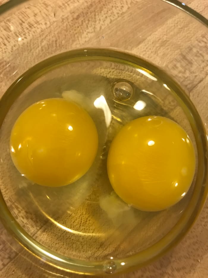It's easier to check for shell fragments and broken yolks if you crack eggs into a small bowl prior to cooking.