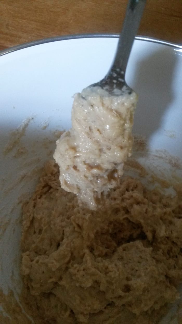 The dough is stiff and is sticking to the fork.