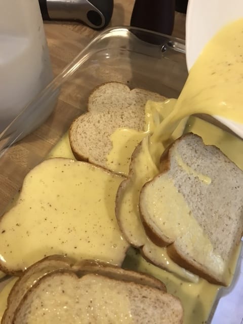 If you have stale bread, allow the batter to soak for a couple of minutes to fully absorb. If you have really fresh, soft bread, you'll only want to add the batter immediately before putting it into the skillet. Otherwise, you may get mush.