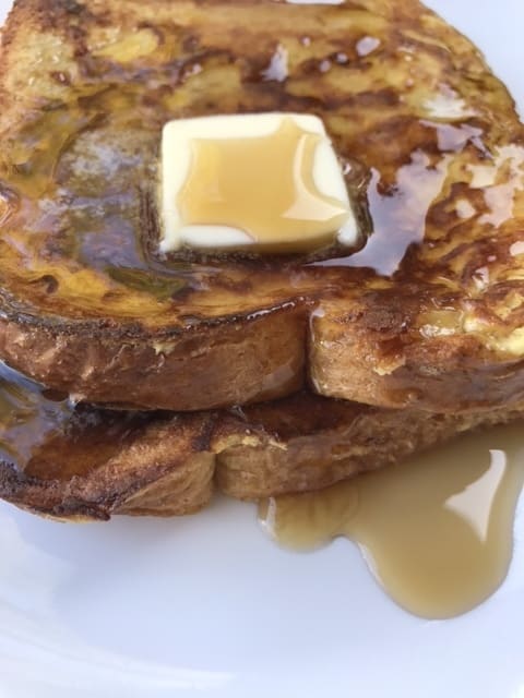 You can use any number of toppings for French Toast, both sweet and savory. My kids are classicists though, and a little butter and syrup are among their favorite ways to eat this comfort food.