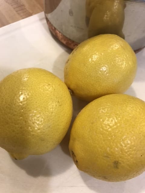 Since you'll be consuming the peel, organic lemons may be the best bet. Look for bright, unblemished fruit for the best results.