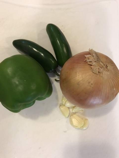 One onion, one bell pepper, a couple of jalapenos and some garlic form the flavor base for the vegetables.