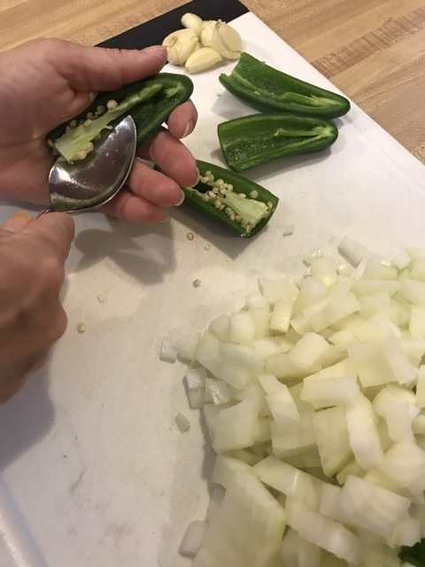 You can control the heat of jalapeno peppers by removing the seeds and white membranes, where the capsaicin is stored. Be careful not to touch your eyes!