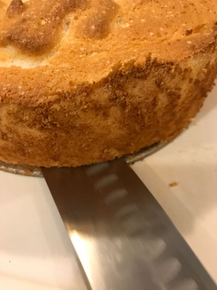Once completely cool, use a knife to run around all the edges of the pan. Don't forget to run the knife around the inner tube. Once loose, simply transfer the cake to a serving plate - you're ready to go!
