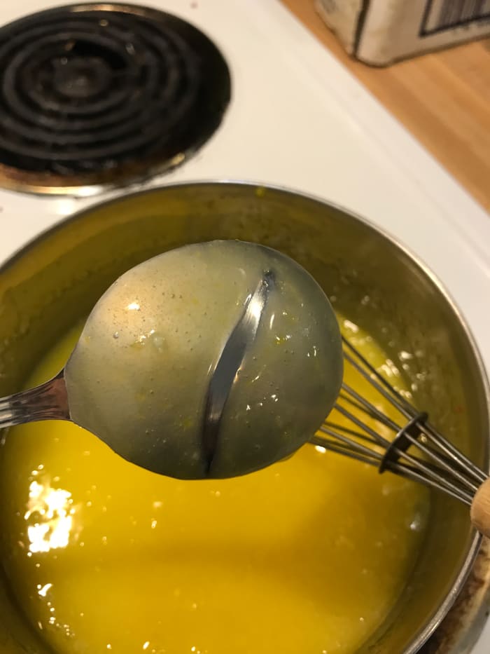 Another test is if you draw a line through the lemon curd on the back of the spoon and it holds. This shows it's been cooked to just the right consistency!