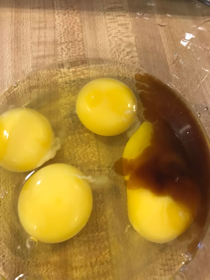 Crack the eggs into a separate small bowl. Check for shells and add the vanilla extract. Set aside while you cream the butter and sugar together.