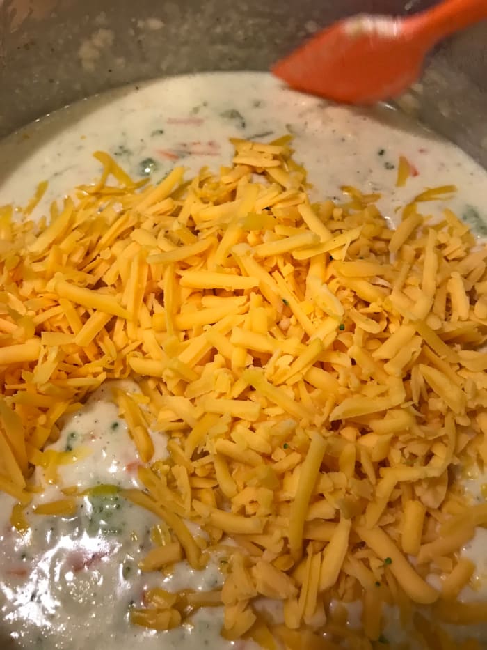 Stir in the grated cheese and stir until melted. I learned the hard way, more is not always better. Too much cheese and the soup gets grainy and can be too salty. Two cups is perfect.