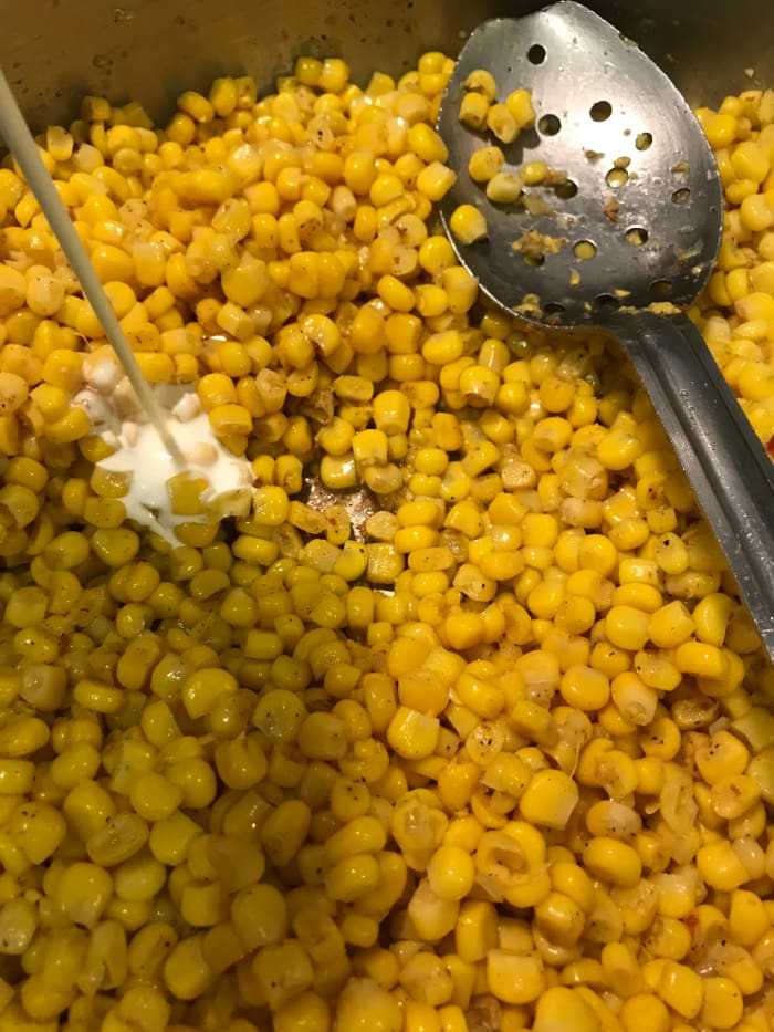 Just a little splash of cream is all you need—about 1/4 of a cup. The cream highlights the flavors of both the corn and the bacon.