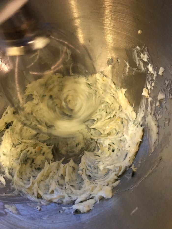 Beat well on medium-high speed for about 2-3 minutes. You really want to whip up and soften the butter, as well as fully incorporate the fresh herbs and roasted garlic.