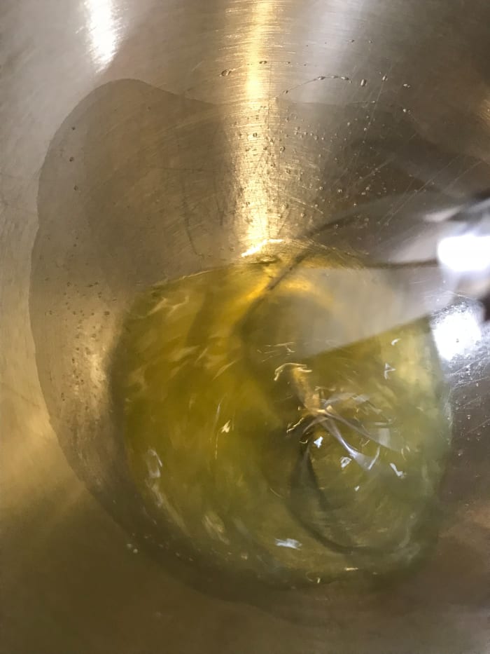 Whisk the whites with a tablespoon of sugar. It's easiest to get the most volume if you have a super clean bowl and make sure there's absolutely no fat - so no yolks in the whites.