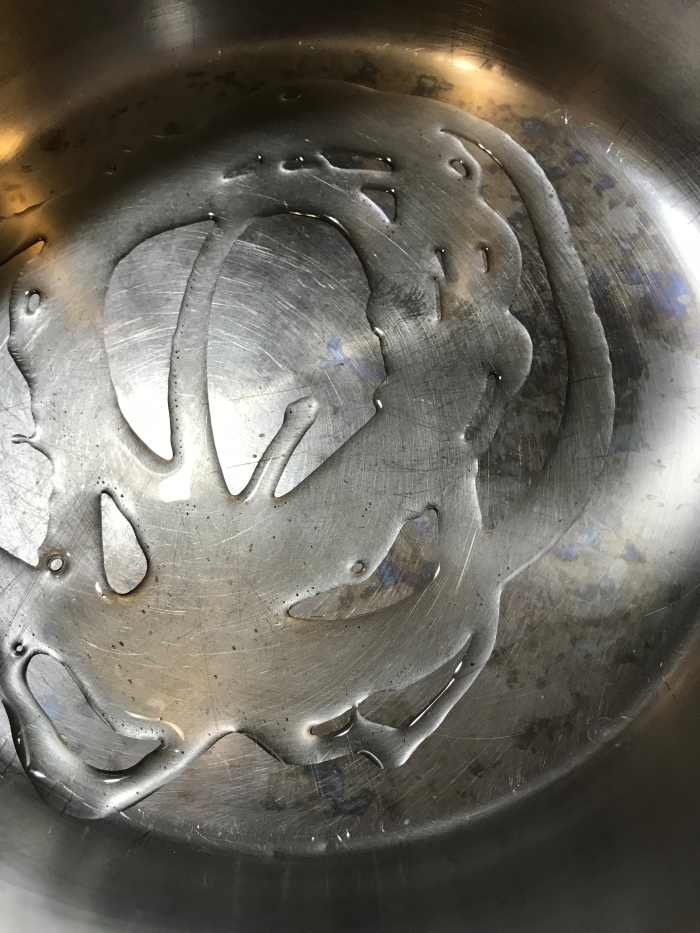 I like using a nice sized soup pot. Place it over medium heat, and add just a couple of teaspoons of olive oil. You'll use it to saute the vegetables.