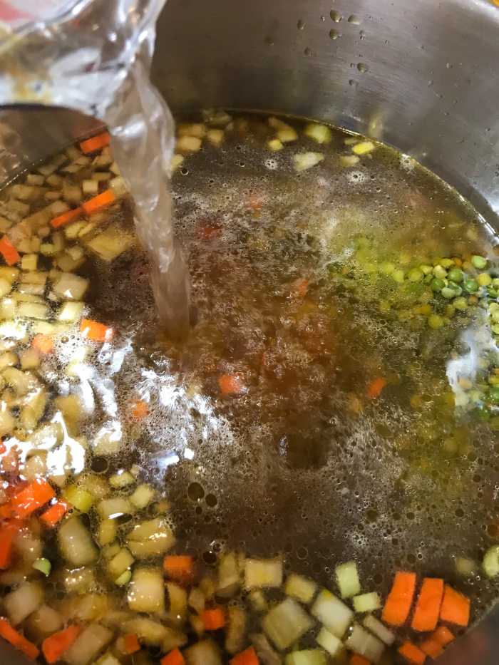 I like using ham broth when I have it, and since the flavor is so strong, I'll use half ham broth and half water. You can use whatever you like though - vegetable or chicken broth both work, as does just plain water.