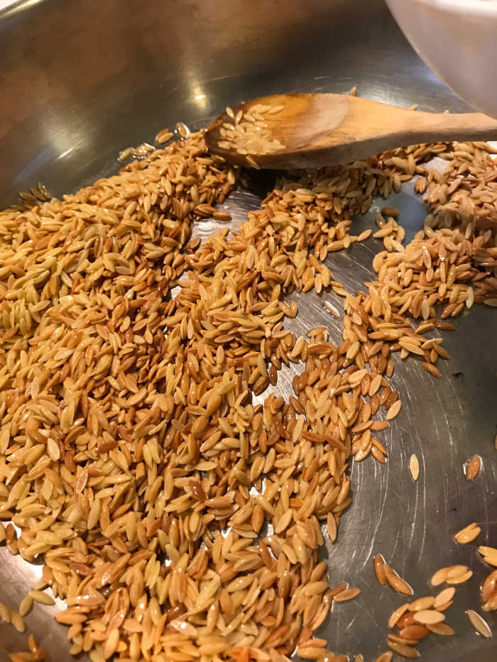Go as far as you dare with the color on the orzo - this is the key to a deep, nutty flavor. Be careful once it begins to get golden though - too far and you'll get scorched, which isn't nice at all.