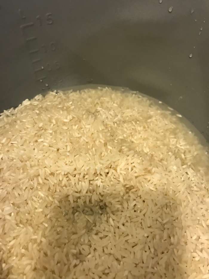 The first step is simply to cook the rice. I love my rice cooker - I can't remember the last time I actually put it away - I use it several times a week. But the stove top is almost as easy.