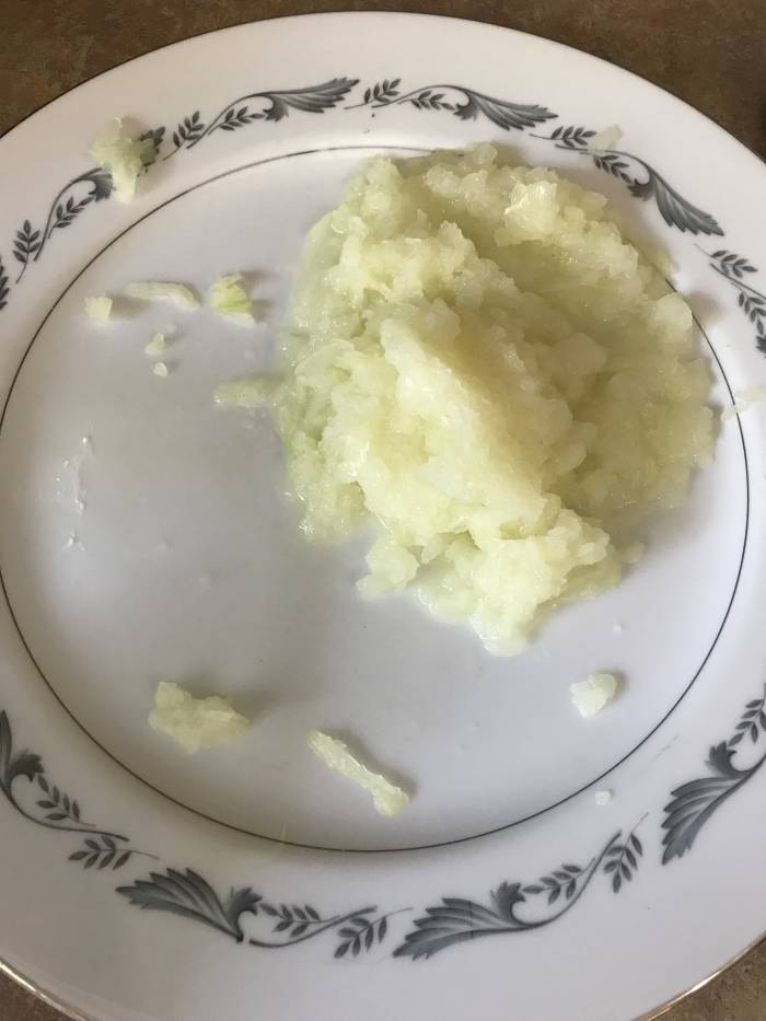 I like grating the onion instead of mincing. The very fine texture practically disappears in the final dish. When grated, more liquid is released, and it becomes really nice and subtle.