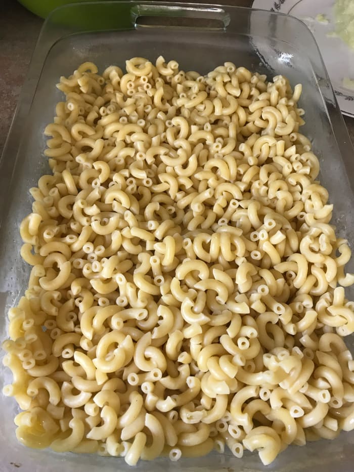 Cook a pound of macaroni according to package directions, usually about ten minutes in salted water at a full boil. You can substitute other pasta if you wish; cavatappi or bow ties work great, too!
