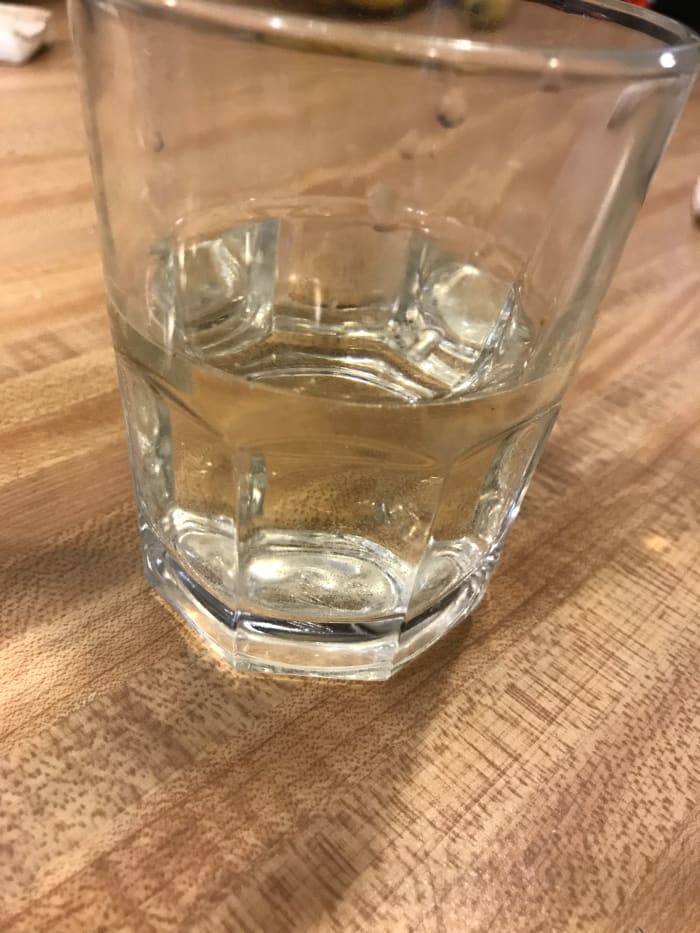 I used white wine in this article, although you can use whatever you like. Broth works well, as does apple or lemon or orange juice. This was an 8 ounce glass and I filled it half full. The measurements do NOT have to be exact - this is easy cooking!