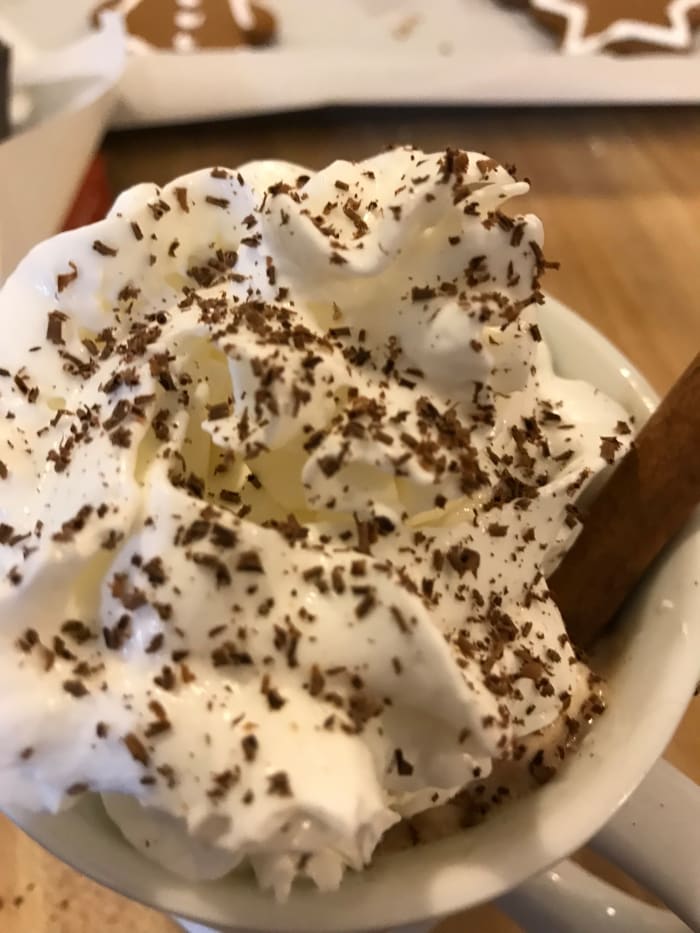 Grate a little semi sweet chocolate over the top of the whipped cream. This adds almost nothing in terms of flavor, but it does make it look amazing for almost no additional effort. Add a cinnamon stick to the whipped cream.
