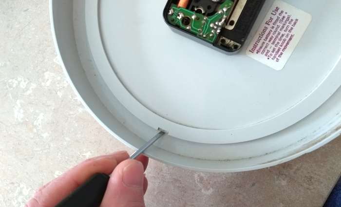 .....alternatively push sideways on the lugs and then push down to remove the faceplate of the clock if you need to replace the mechanism or hands.